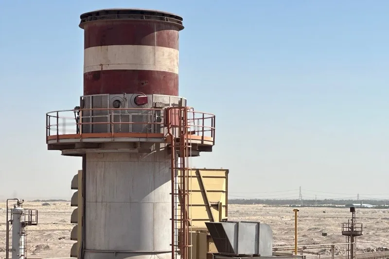 The exhaust stack and structure of a power plant.